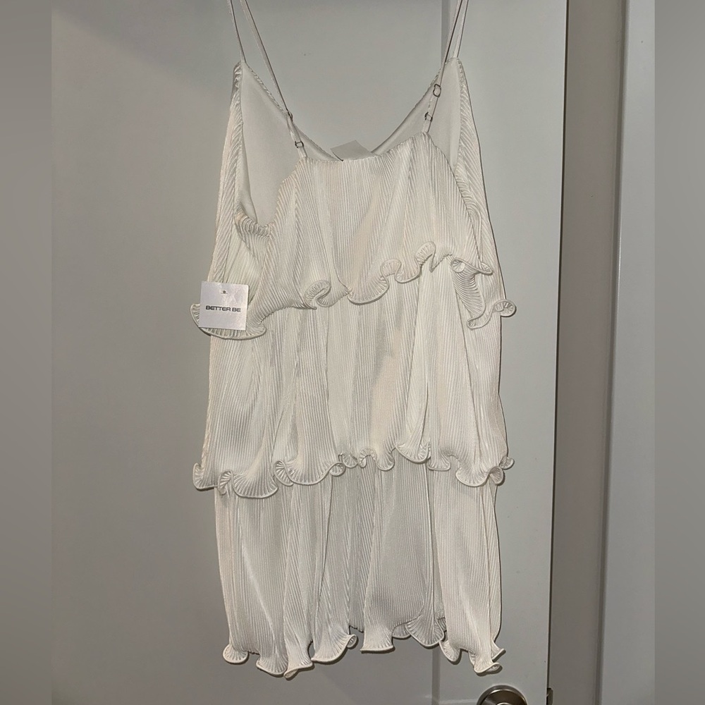 White satin ruffle mini dress. NEVER WORN. Size large.